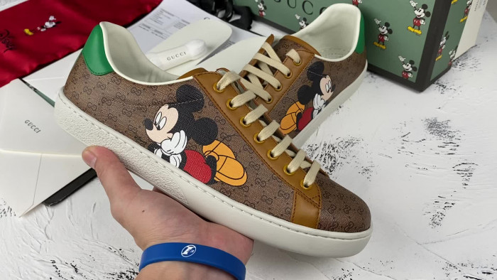 gu ace embroidered low-top sneaker