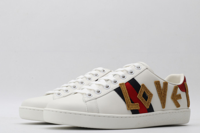 gu ace embroidered low-top sneaker
